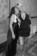 Chic Black Mini Homecoming Dress with Deep V Neck and Sleek Fitted Shape