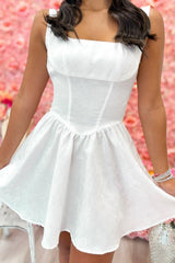 Chic White Homecoming Dress with Bow Accent and Flirty Flared Skirt