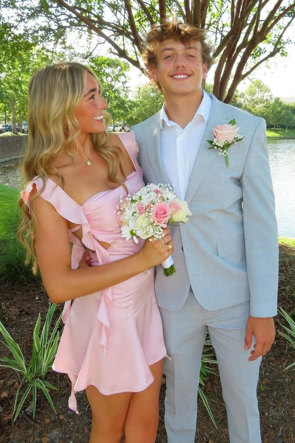 Trendy Blush Pink Dress with Side Cutouts and Statement Ruffle Straps