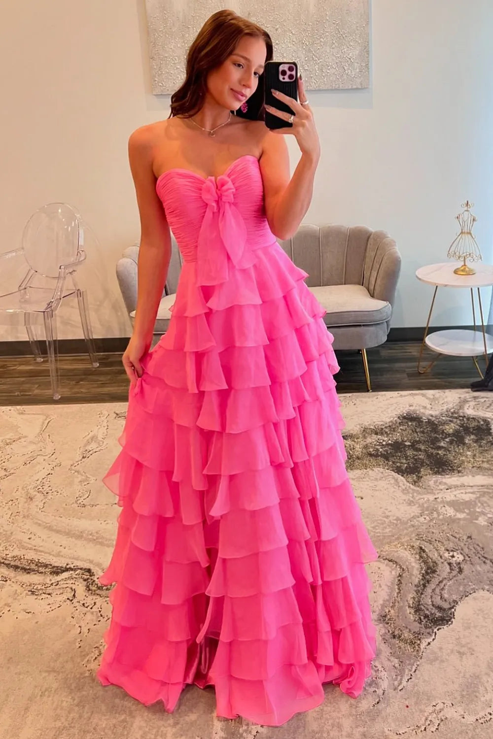 Romantic Pink Sweetheart A-Line Prom Dress with Layered Ruffles and Bow Detail