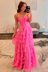 Romantic Pink Sweetheart A-Line Prom Dress with Layered Ruffles and Bow Detail