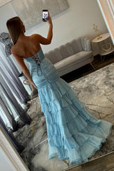 Light Blue Sweetheart Mermaid Prom Gown with Lace-Up Bodice and Ruffled Hem