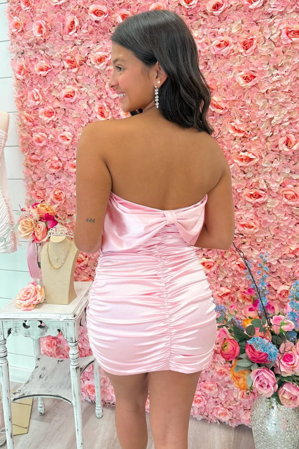Pink Satin Strapless Bodycon Mini Dress with Ruched Skirt and Bow Back Accent