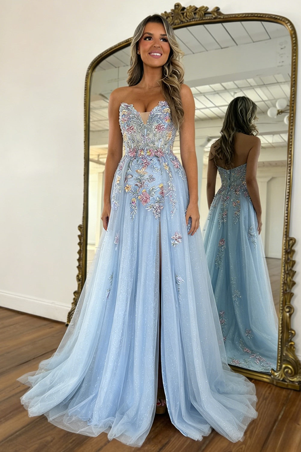 Light Blue Strapless Tulle Prom Dress with Floral Appliqué and Flowing Train