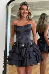 Trendy Strapless Ruffle Tiered Hoco Dress with Satin Bow Accents and Crystal Details
